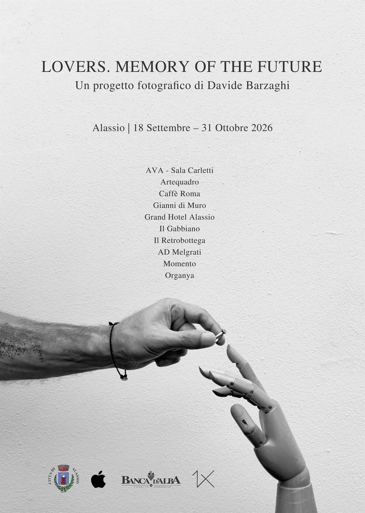Human hand touching a robotic hand, text about Lovers photographic project.